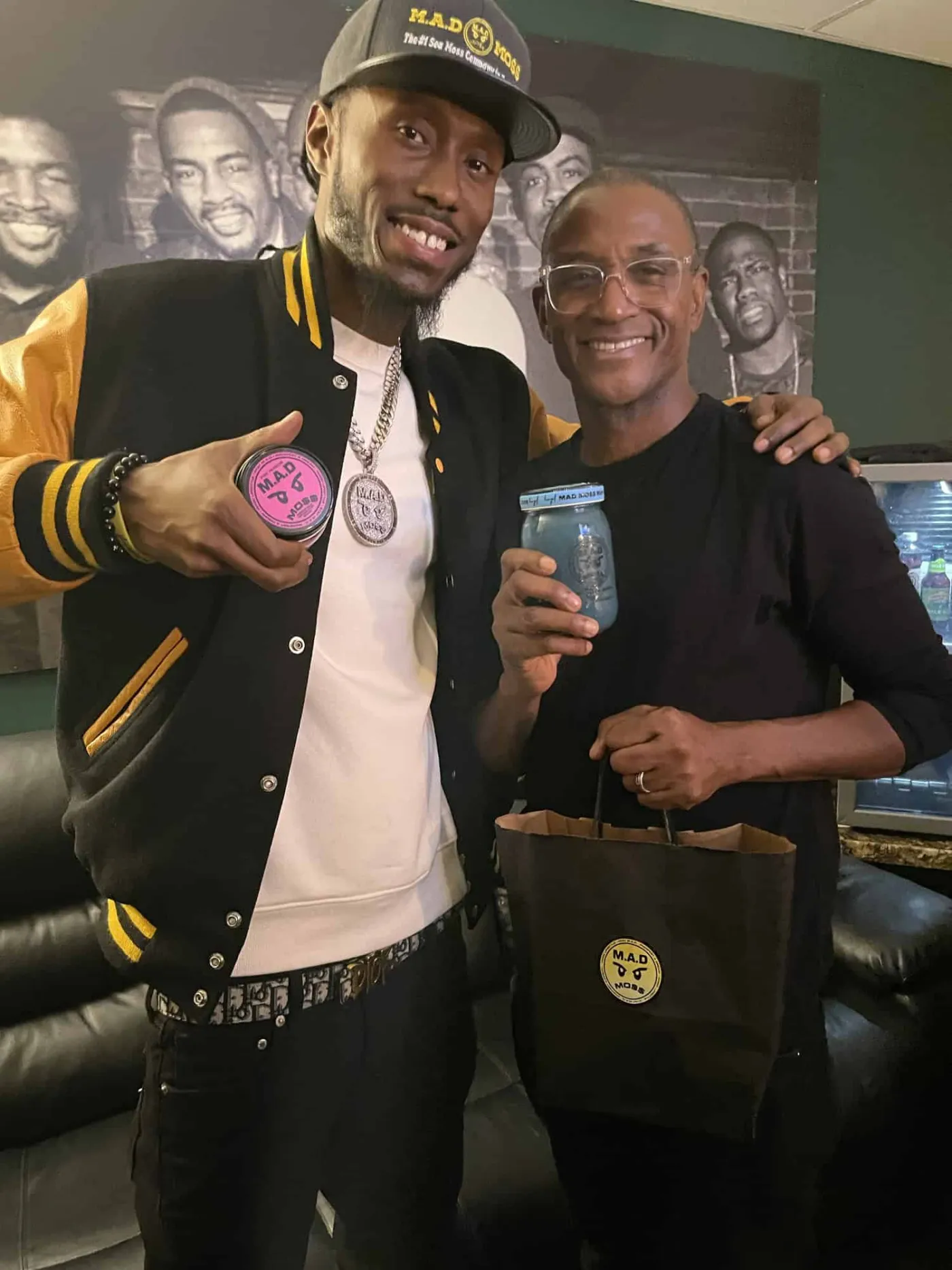 The founder with a supporter at a M.A.D MOSS pop-up